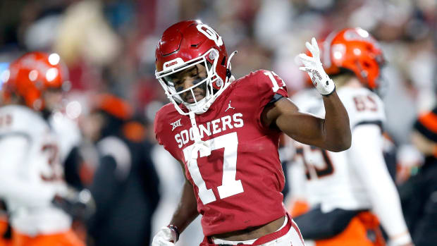 Oklahoma's Marvin Mims Jr. (17) celebrates a return on a kick off in the first half during the Bedlam college football game between the University of Oklahoma Sooners (OU) and the Oklahoma State University Cowboys (OSU) at Gaylord Family-Oklahoma Memorial Stadium, in Norman, Okla., Saturday, Nov., 19, 2022. marvin mims